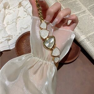 Elegant Gold and White Watch